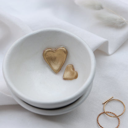Small white trinket dish with gold hearts